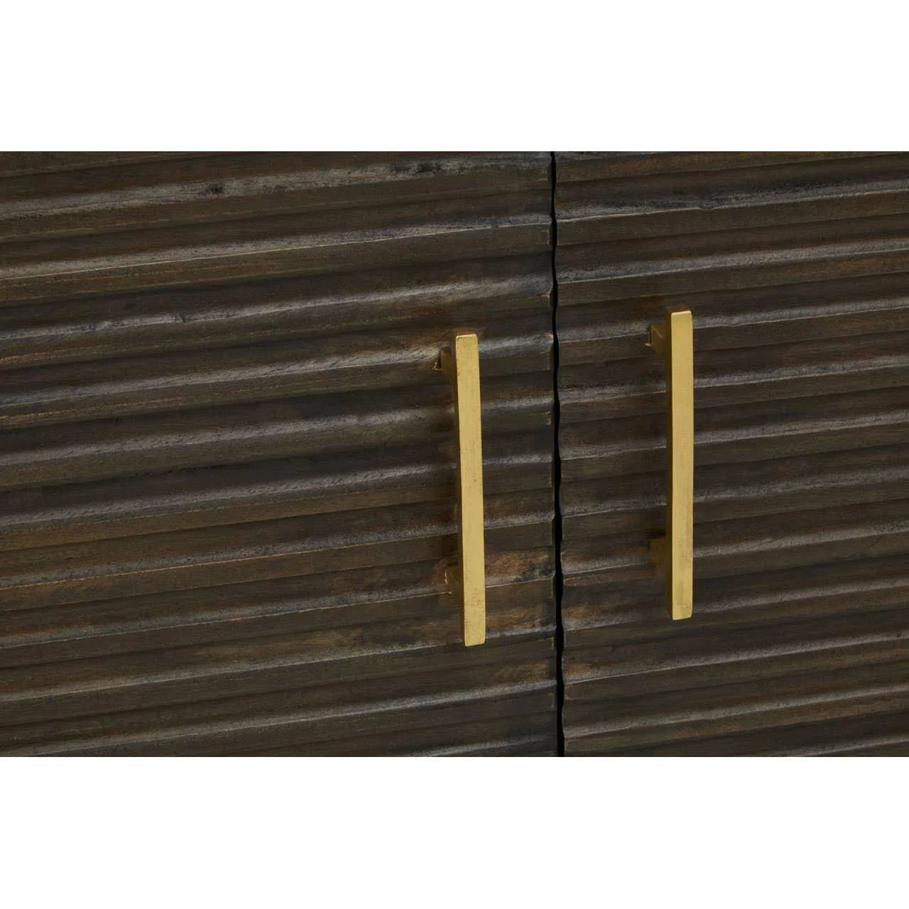 Textured wood cabinet doors with gold metal handles closeup