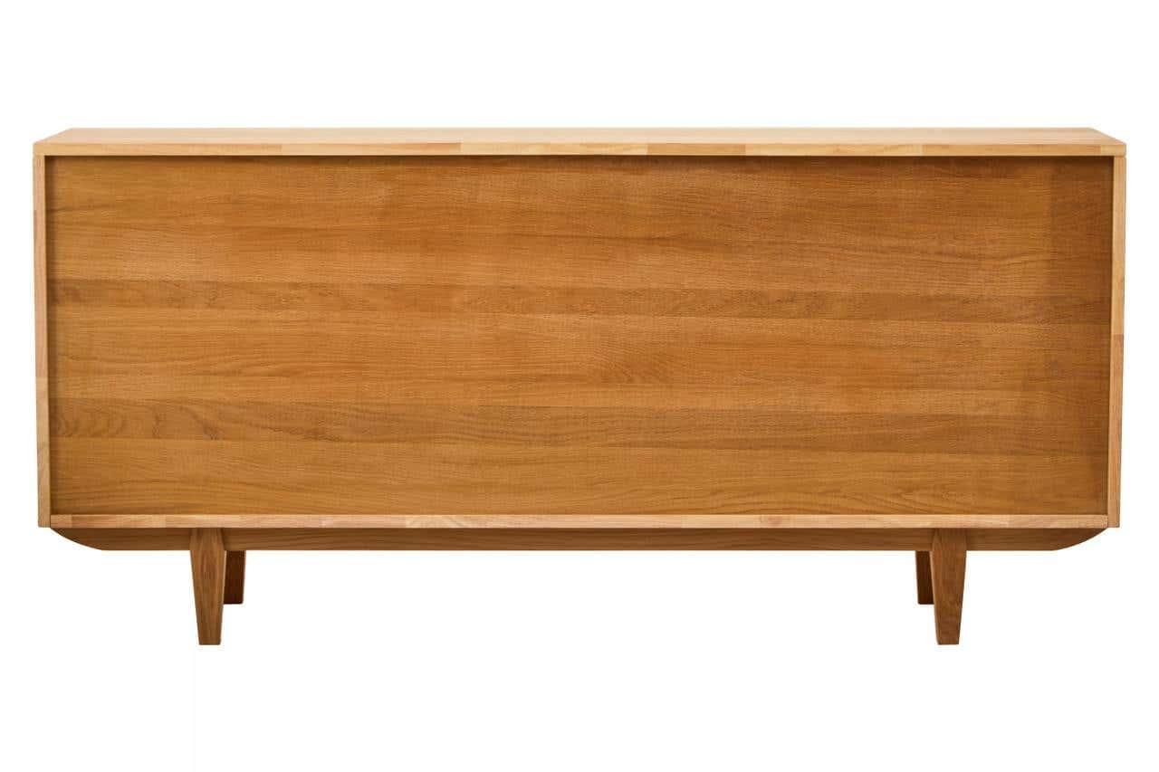 Back view of wooden sideboard with tapered legs and smooth oak finish
