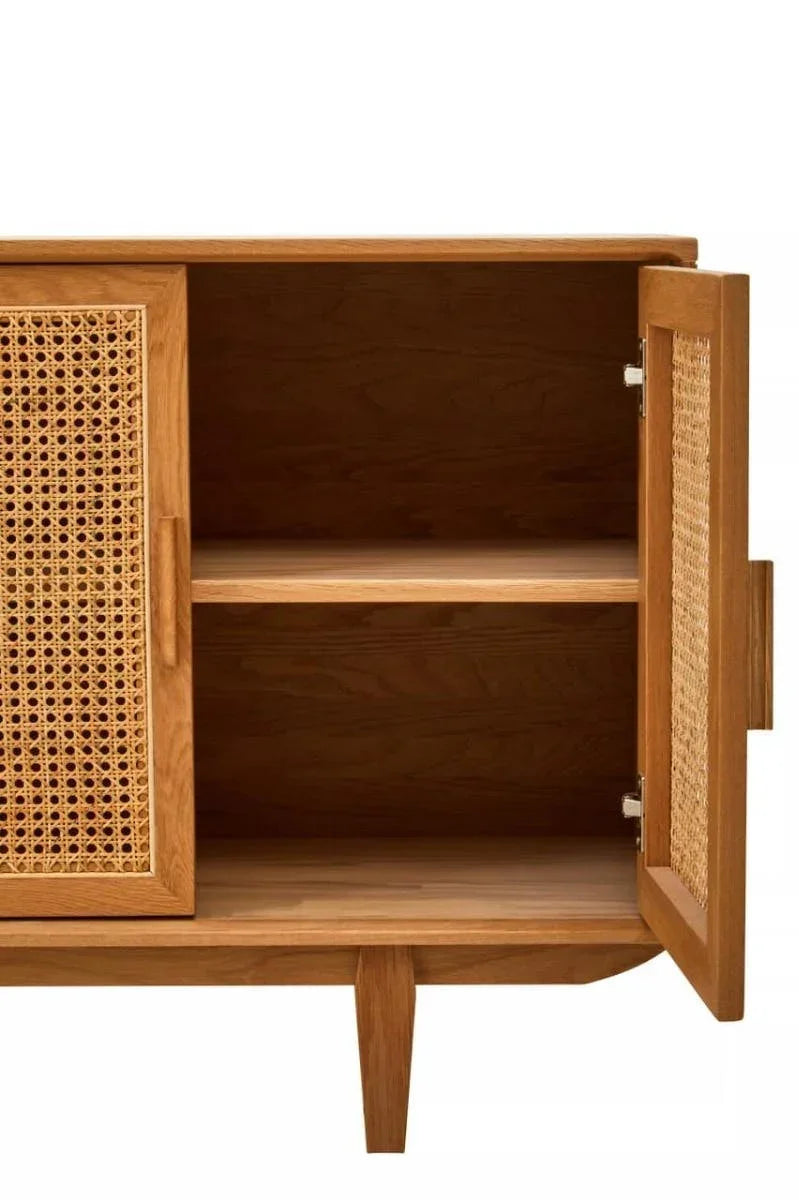 Wood sideboard with cane doors open, showing interior shelf and leg detail