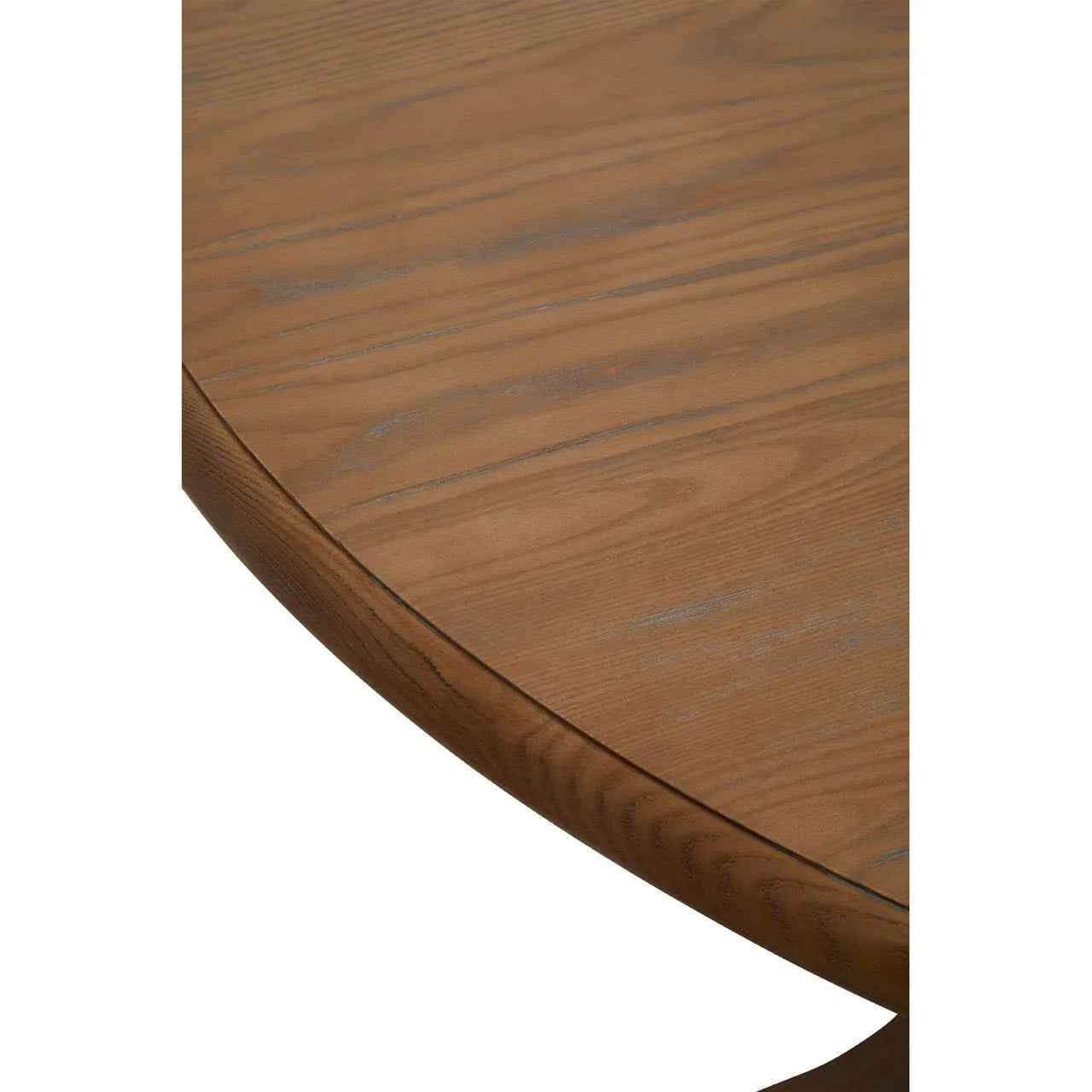 Close-up of round wooden dining table top with smooth finish and natural grain detail