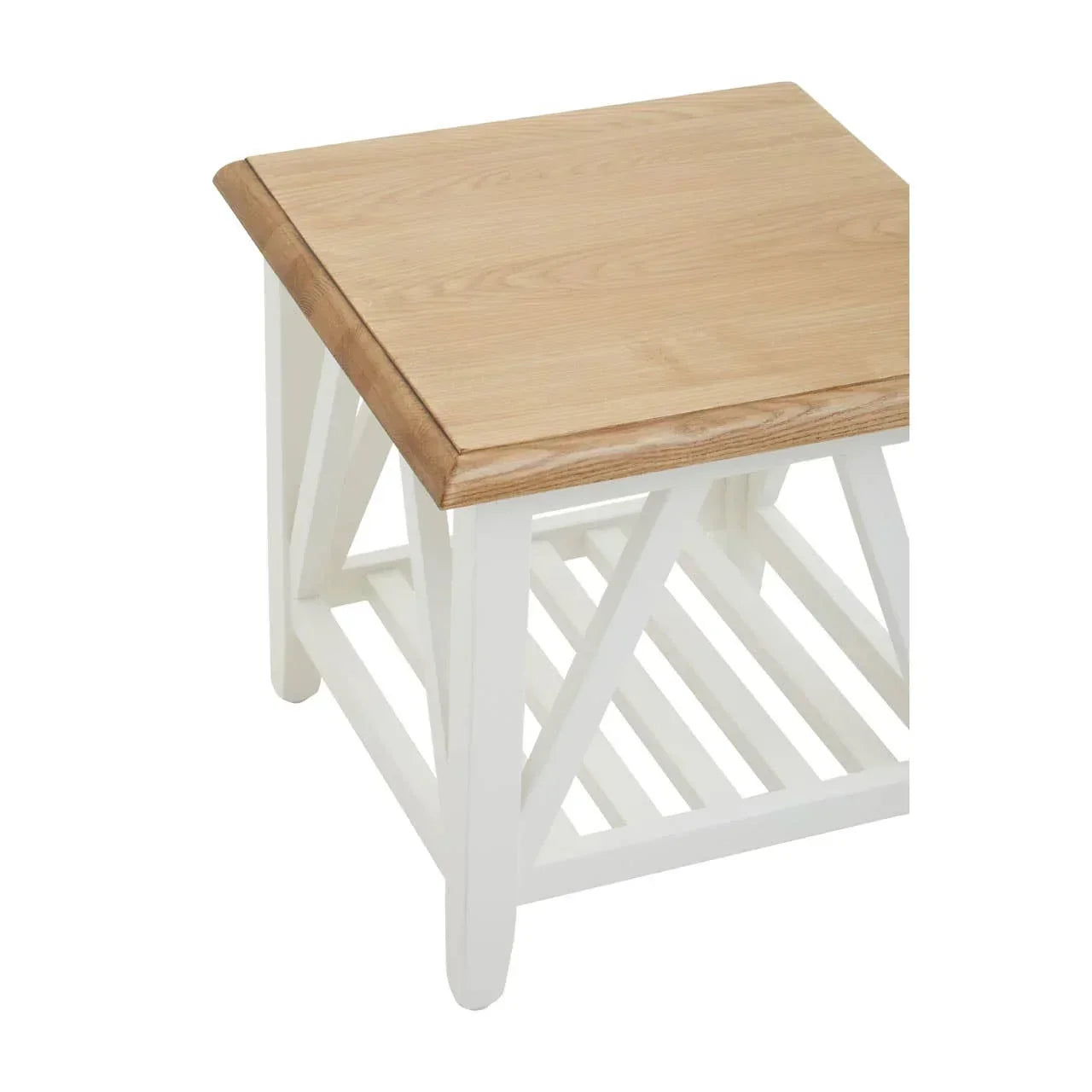 Wooden side table with light oak top and white painted frame, lower slatted shelf visible