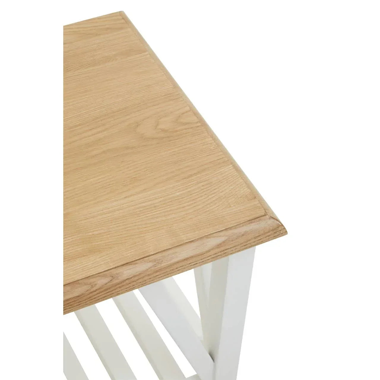 Oak top side table with white slatted base, close-up of wood grain and corner detail