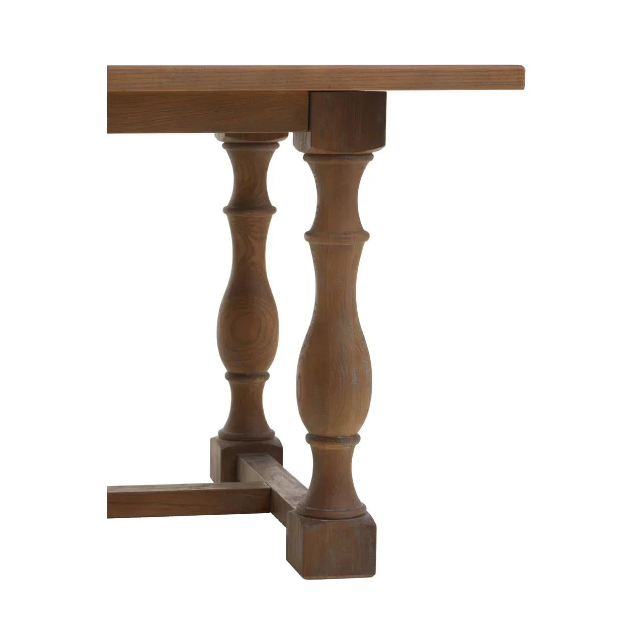 Solid wood dining table with carved pedestal legs, partial side view