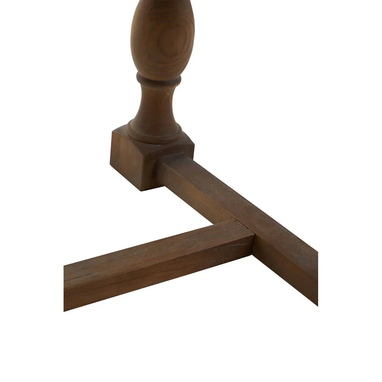 Solid wood table base with square legs and turned central support, close-up angle