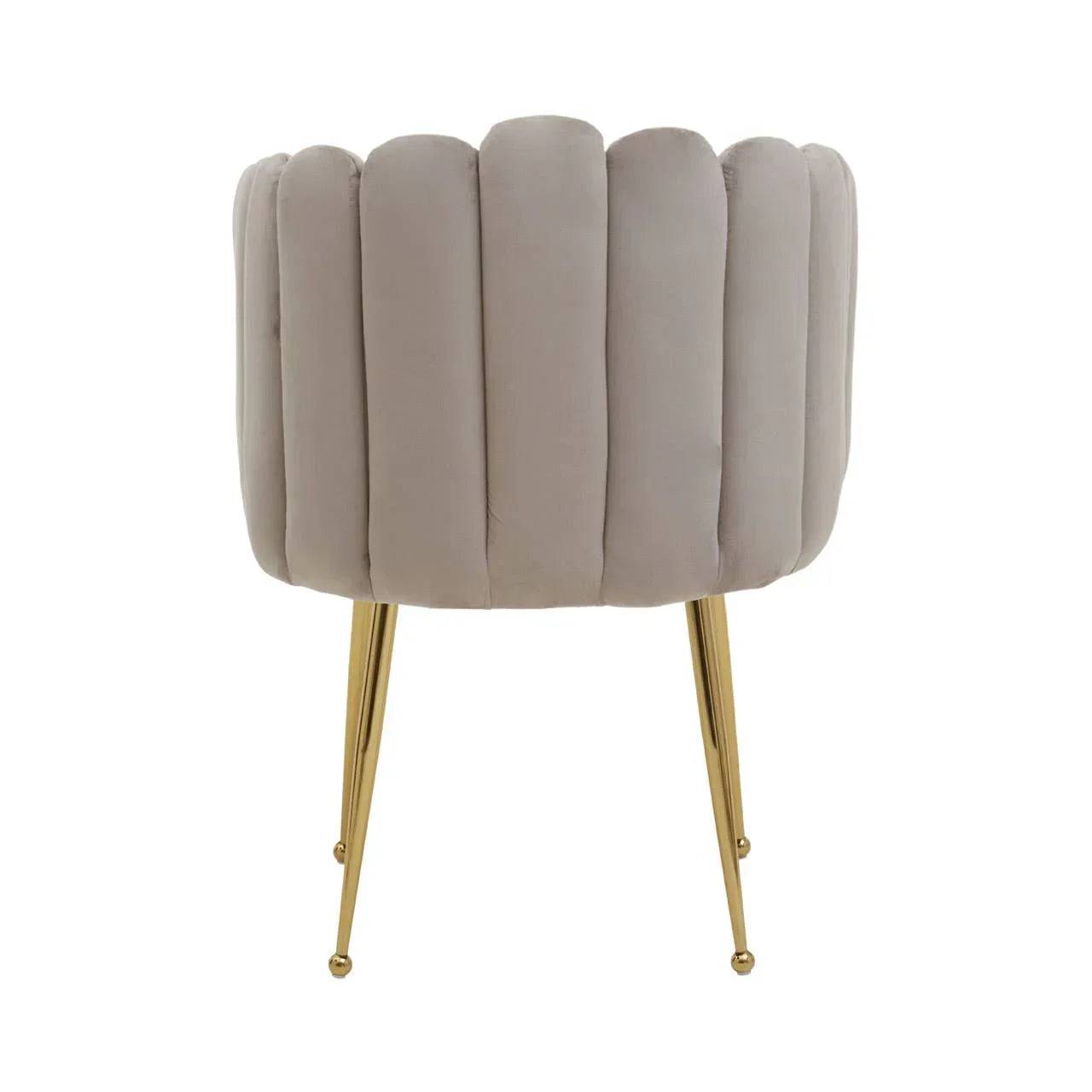 Beige velvet accent chair with scalloped back and gold metal legs, rear angle view