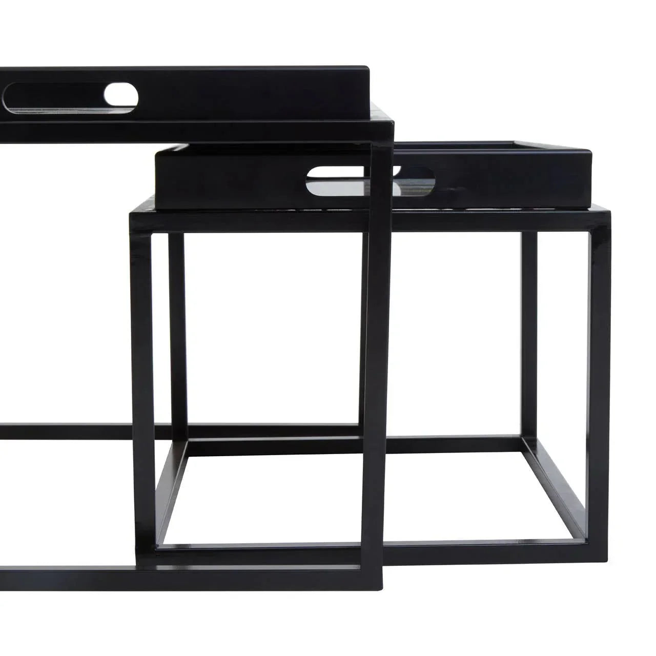 Black metal nesting tables with tray tops and cut-out handles, modern geometric design