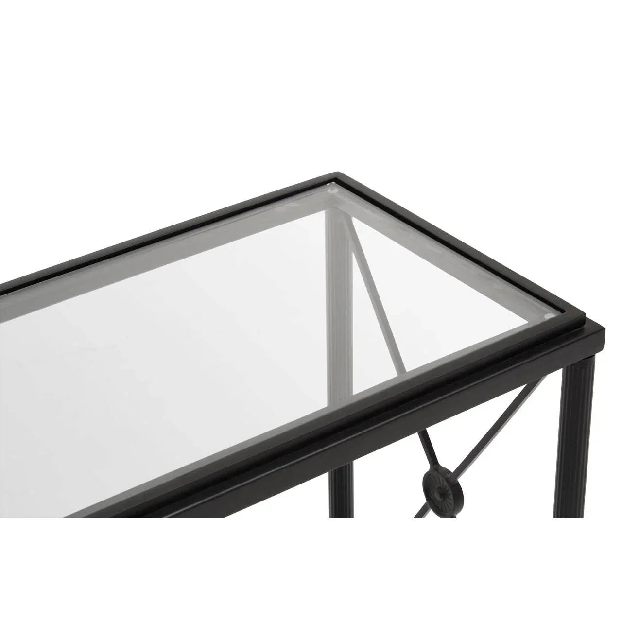 Metal and glass side table with black frame and decorative leg detail, close-up view