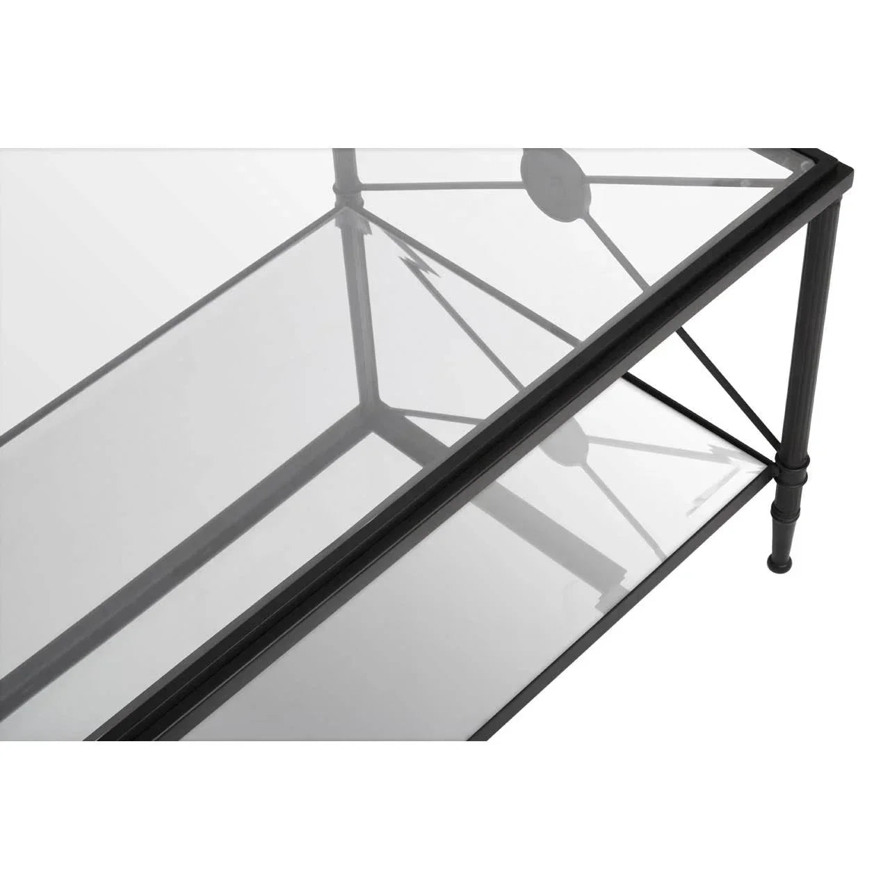 Glass top coffee table with black metal frame and lower shelf, angled view