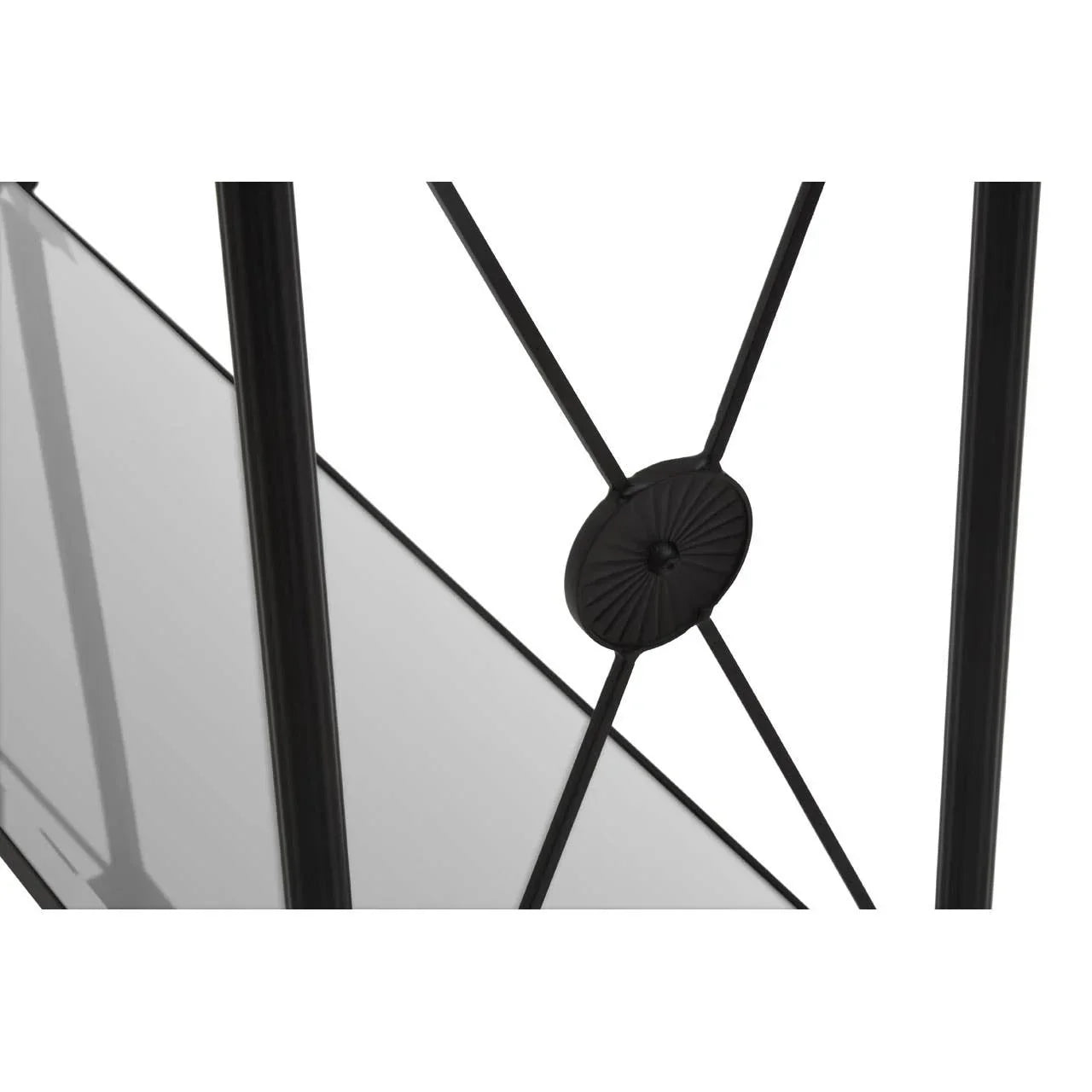Black metal table frame detail with decorative X pattern and round central accent