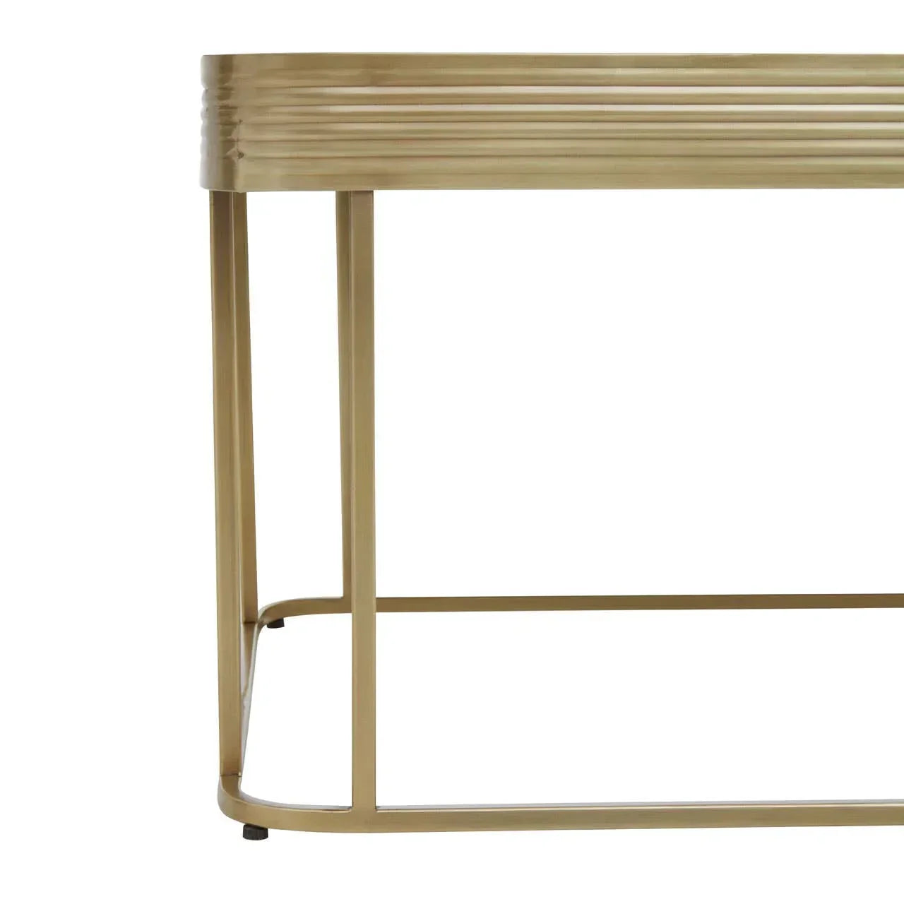 Gold metal console table with ribbed edge detail and minimalist legs