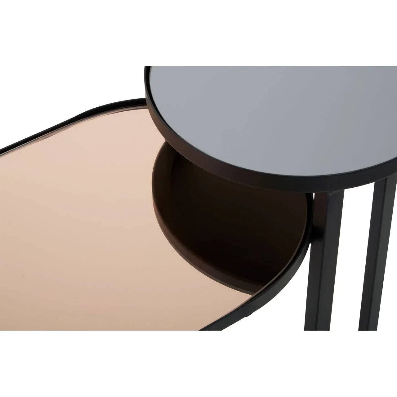 Black metal nesting side tables with round glass tops, close-up view