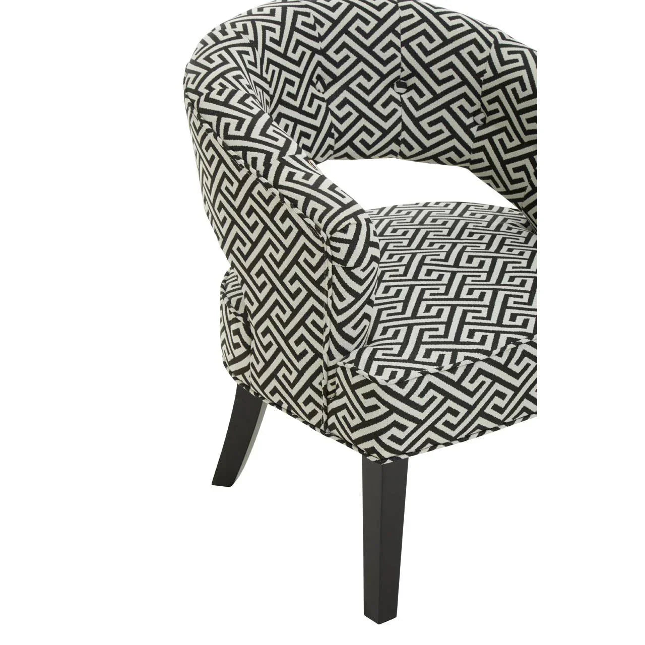 Black and white patterned accent chair with curved back and dark wooden legs