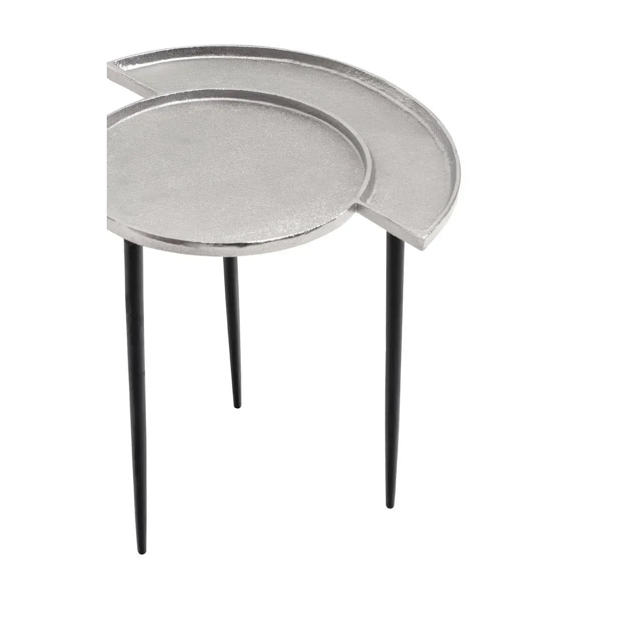 Silver metal nesting side table with round top and black tapered legs