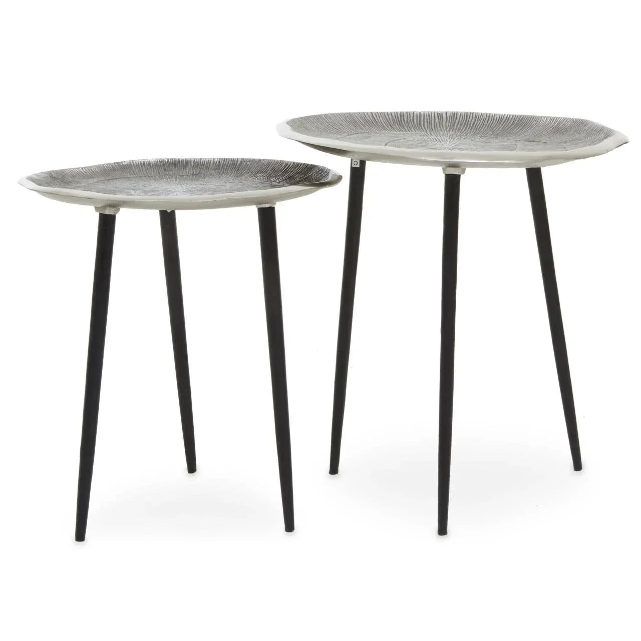Set of two metal side tables with black legs and textured silver tops on white background