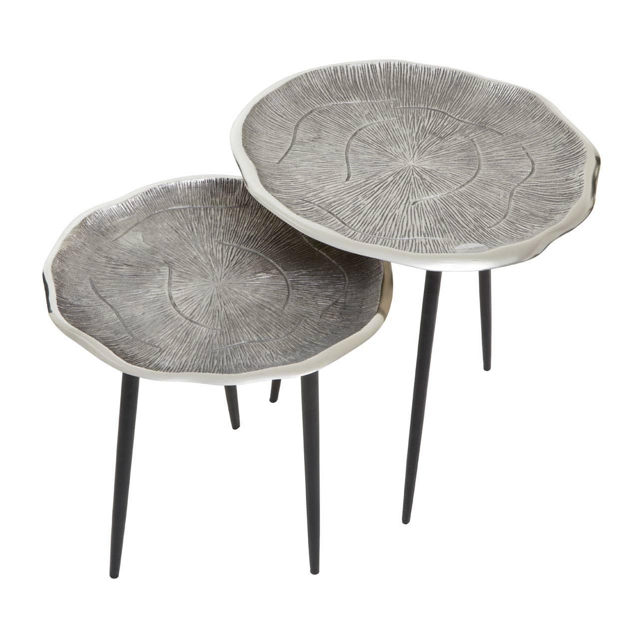 Set of two metal nesting side tables with textured silver tops and black legs