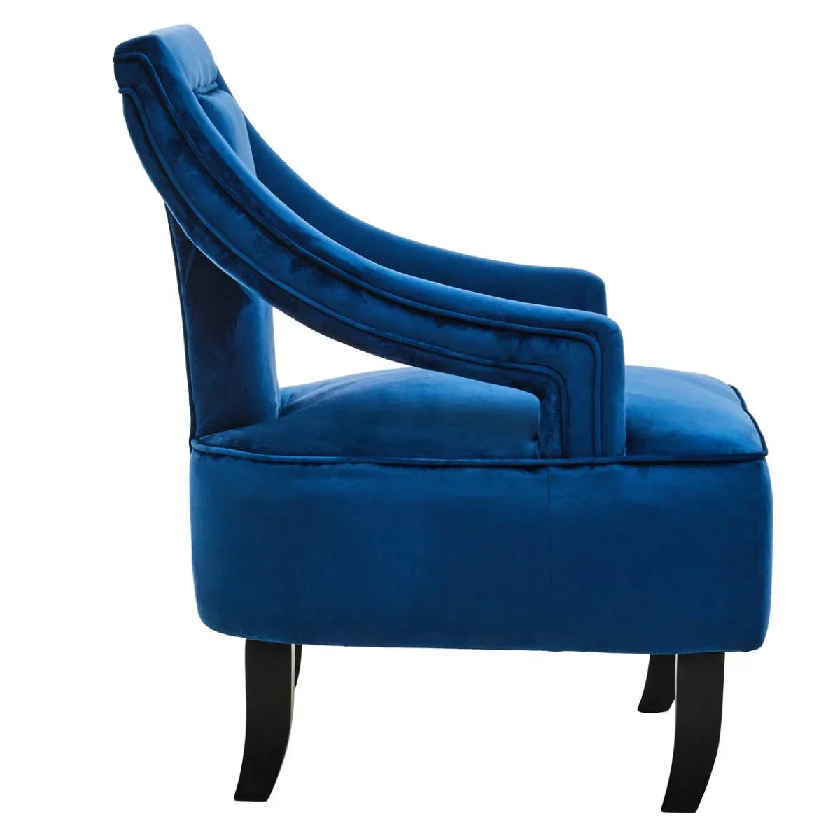 Blue velvet accent chair with curved backrest and dark wood legs side view
