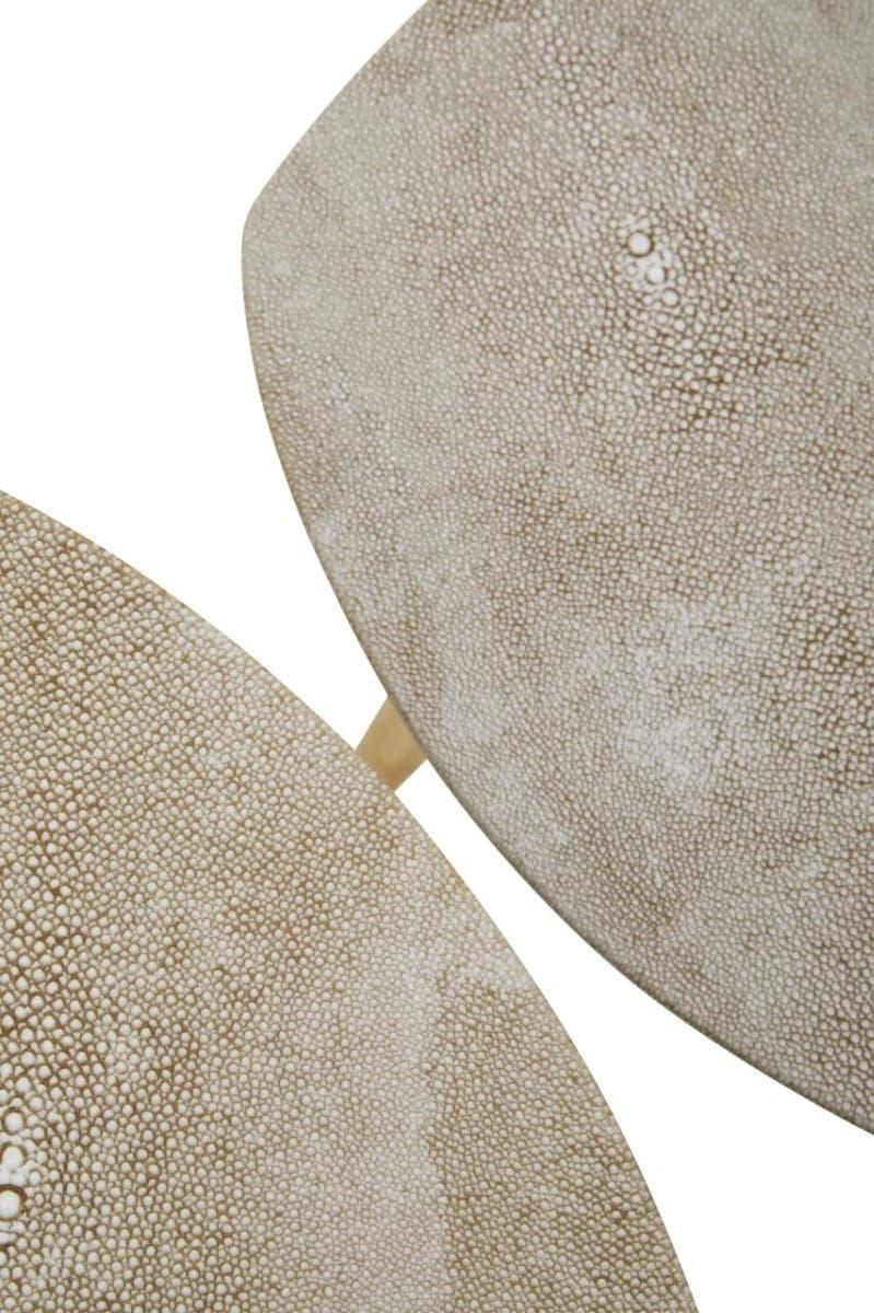 Beige textured nest of tables with faux shagreen finish, close up of surface detail