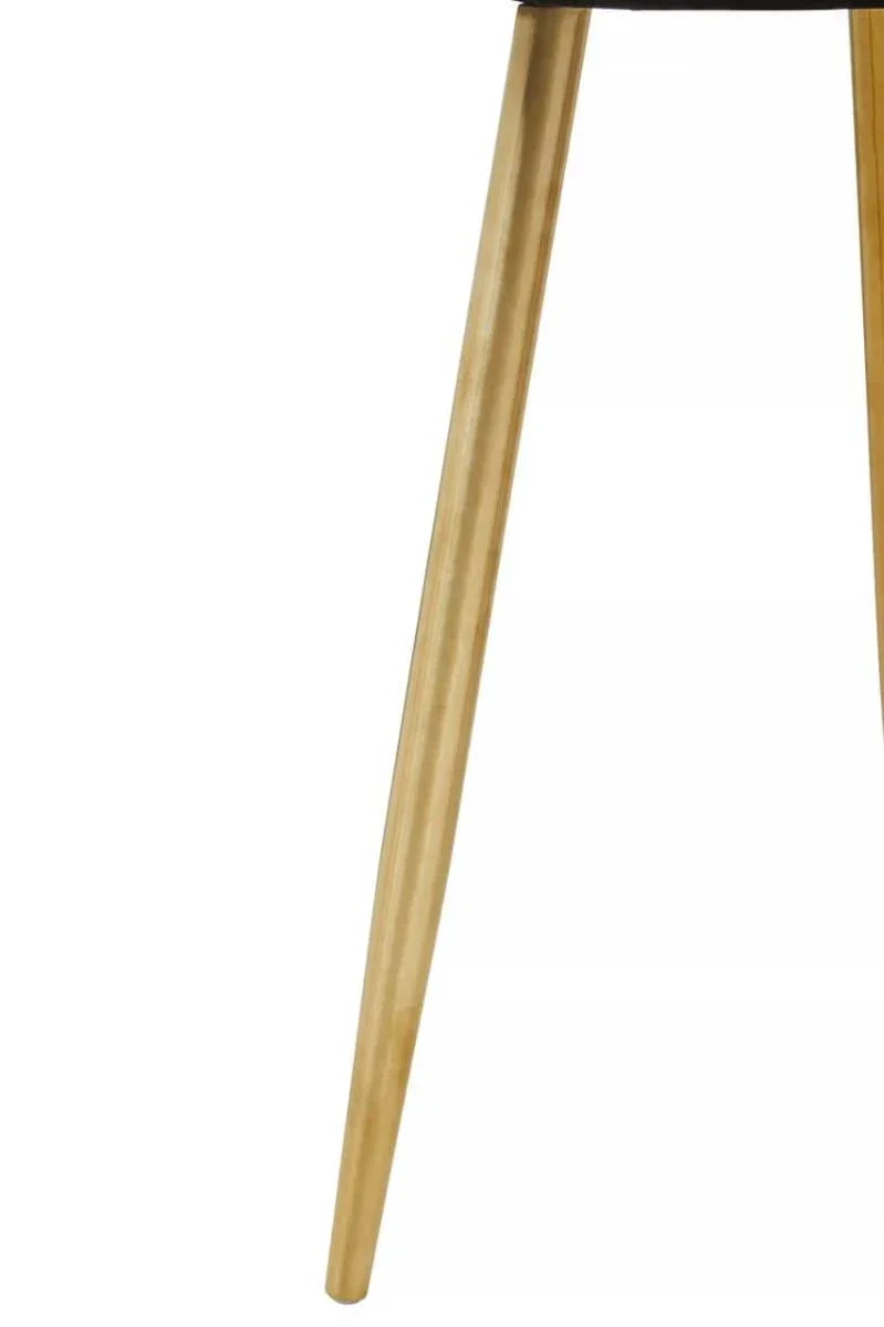 Angled view of light wood chair leg with natural grain detail