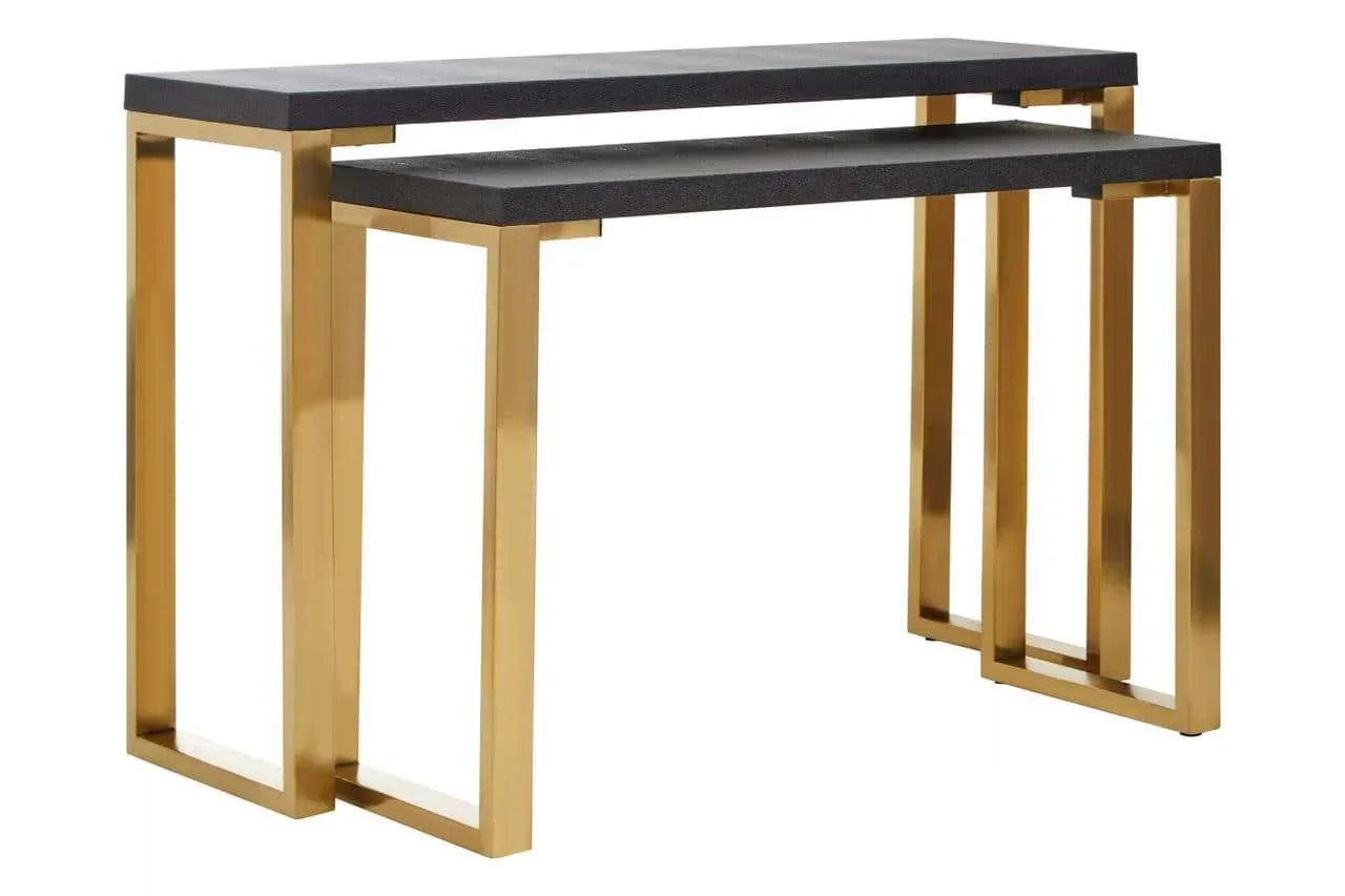 Nesting console tables with black tops and gold metal frames, modern geometric design