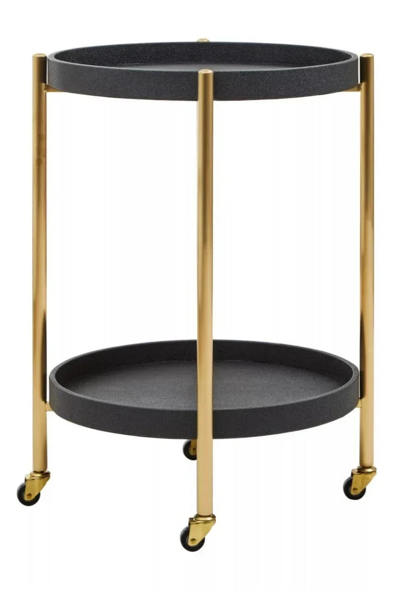 Black round bar trolley with two shelves and gold metal legs on caster wheels
