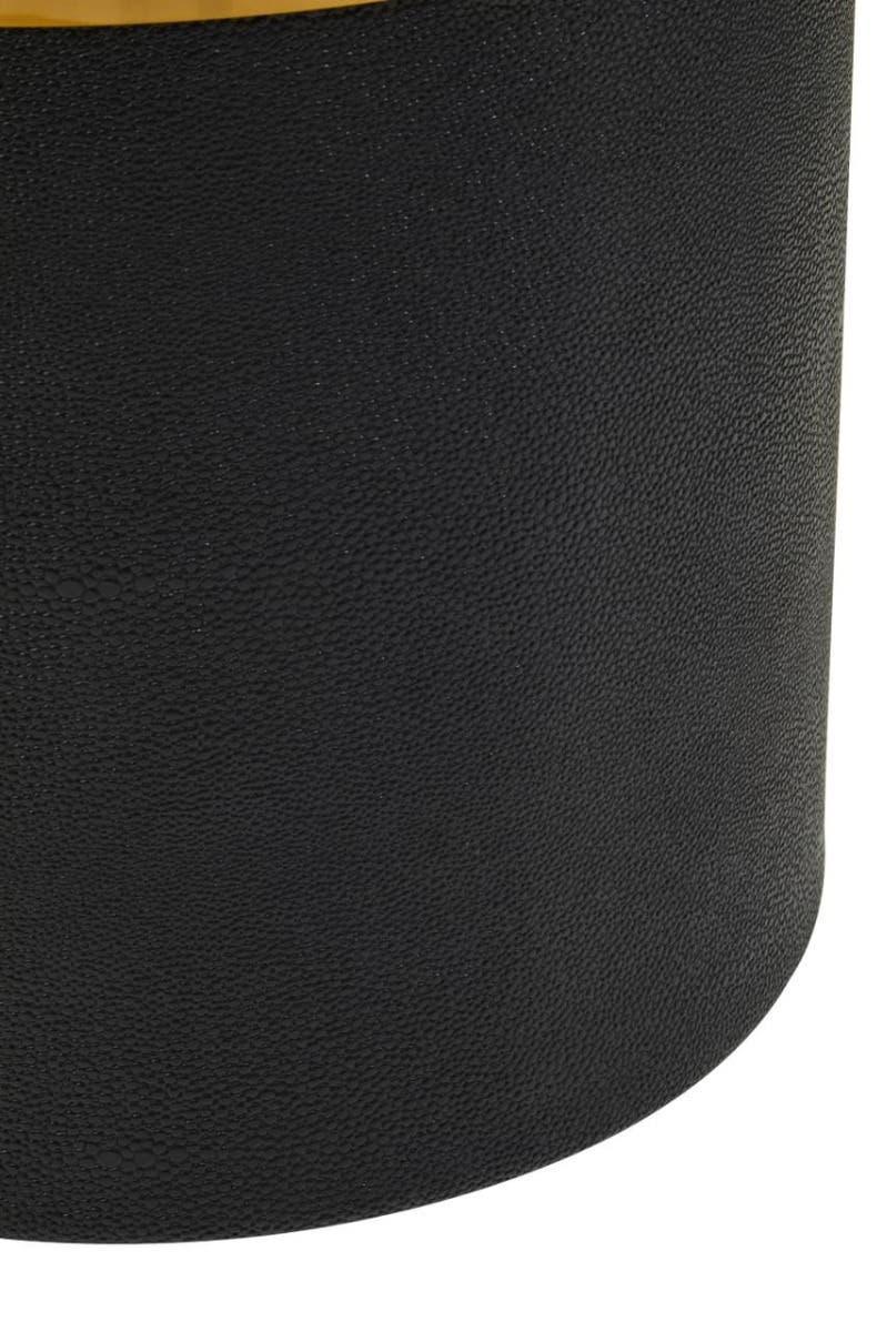 Black textured furniture base with rounded edge and mustard yellow upholstered seat detail