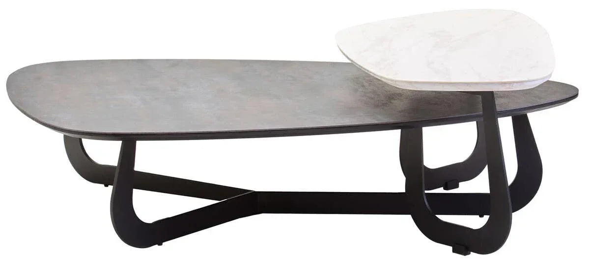 Modern coffee table with black metal legs, large dark surface and small white marble top