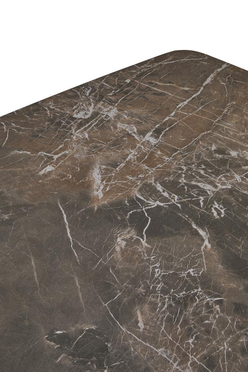 Close up of brown marble dining table top with white veining