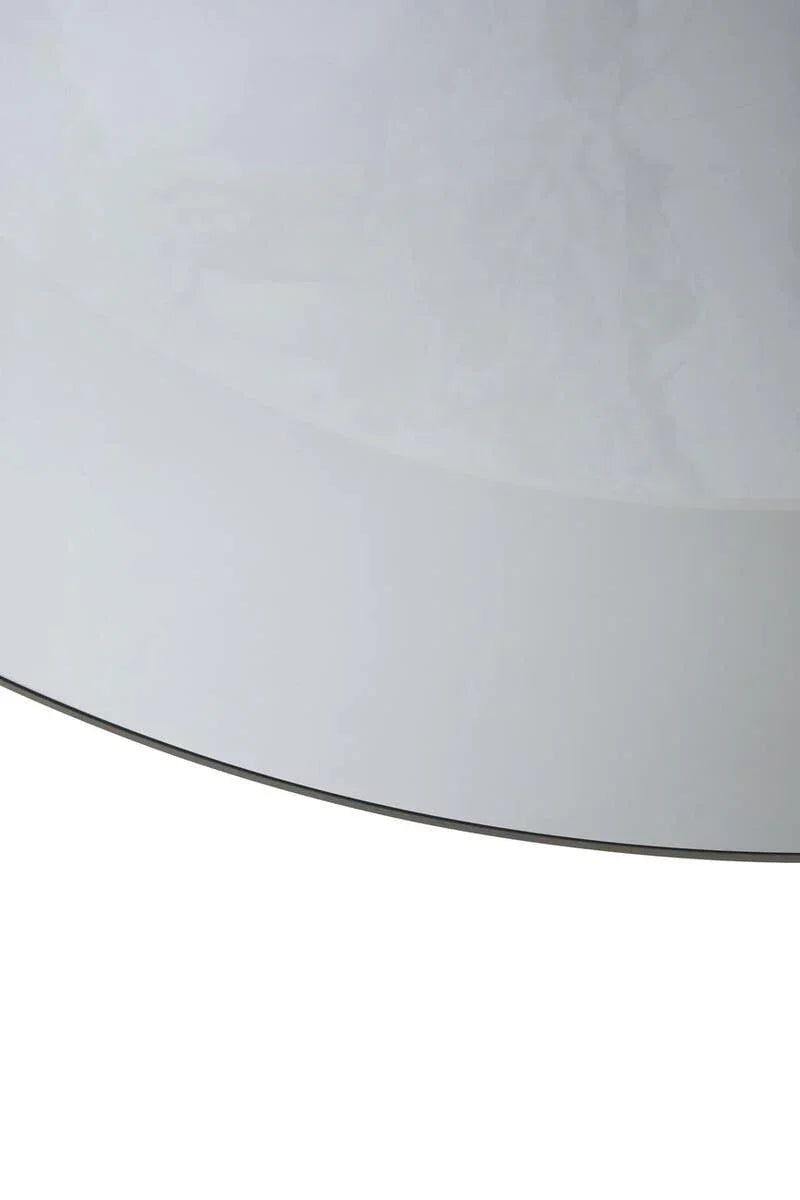 Close-up of round white marble effect dining table edge