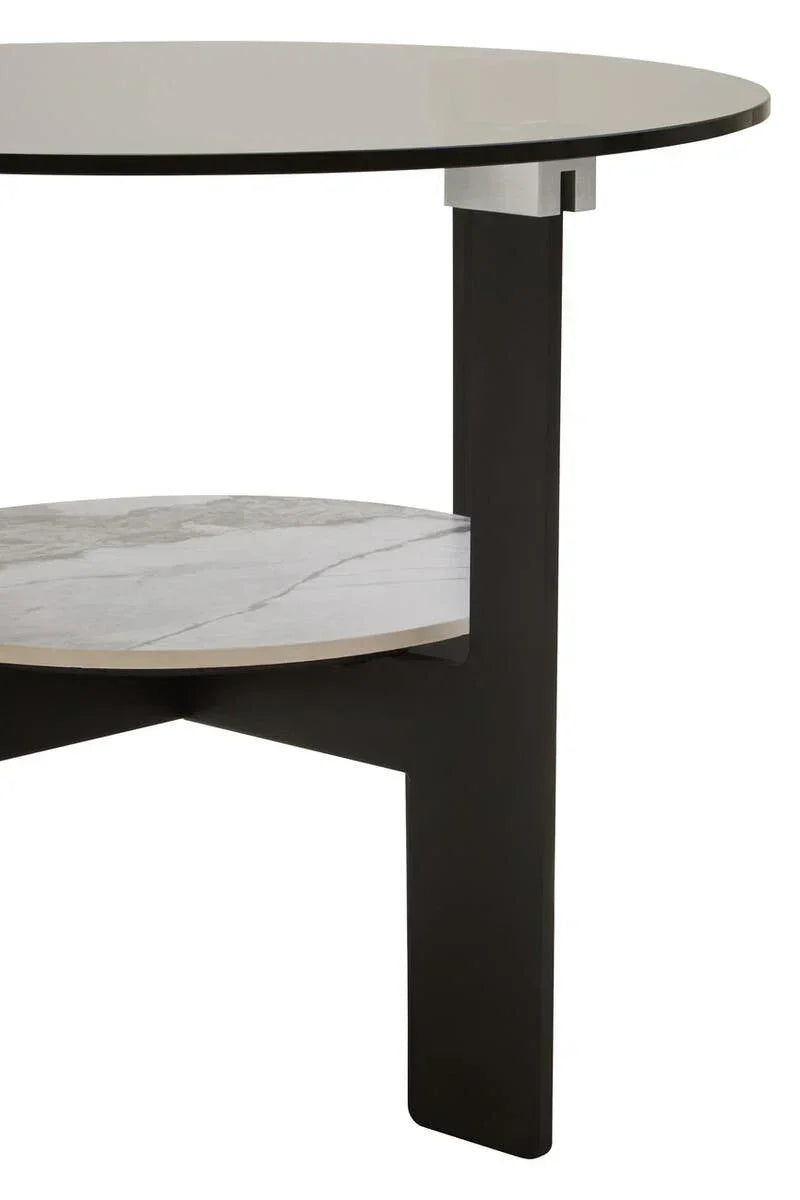 Round coffee table with black frame, glass top, and lower marble-effect shelf
