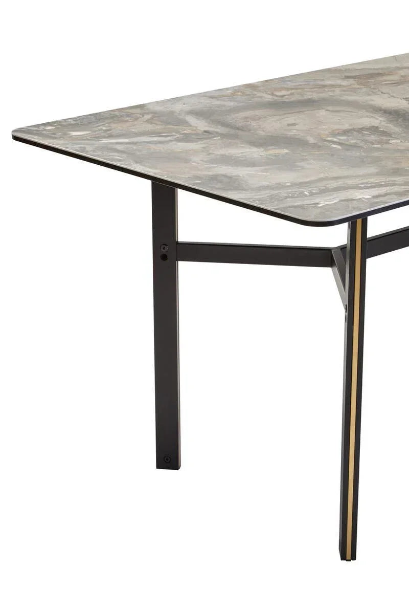 Rectangular marble dining table with black metal legs, corner view