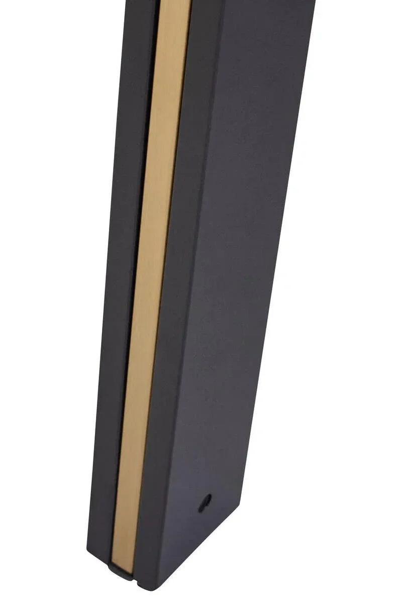 Close up of black and gold metal table leg with modern square design