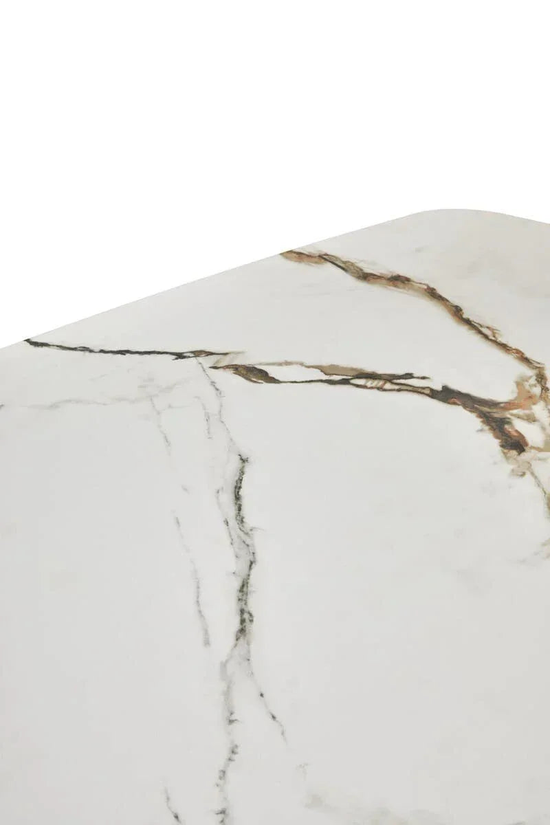 close-up of marble dining table top with natural veining pattern