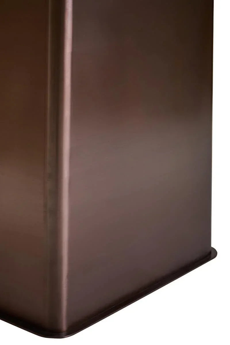 Bronze metal base of furniture piece with smooth finish and rounded corner detail