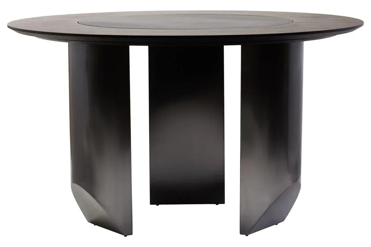 Round black dining table with a modern pedestal base and smooth wooden top
