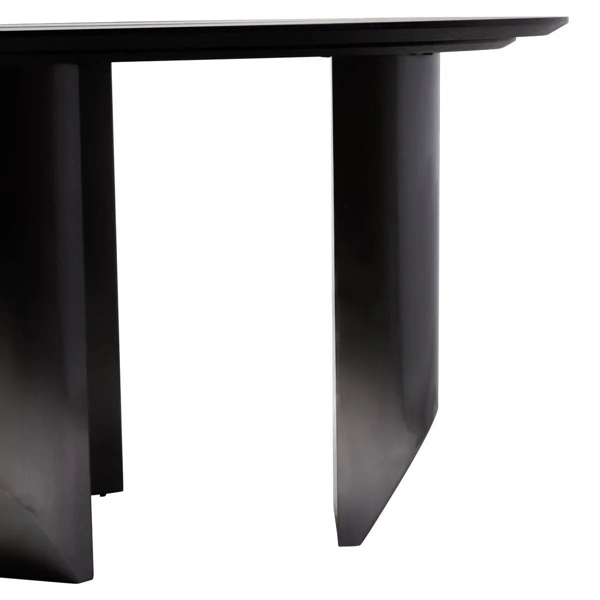 Black dining table metal legs close-up with angular modern design