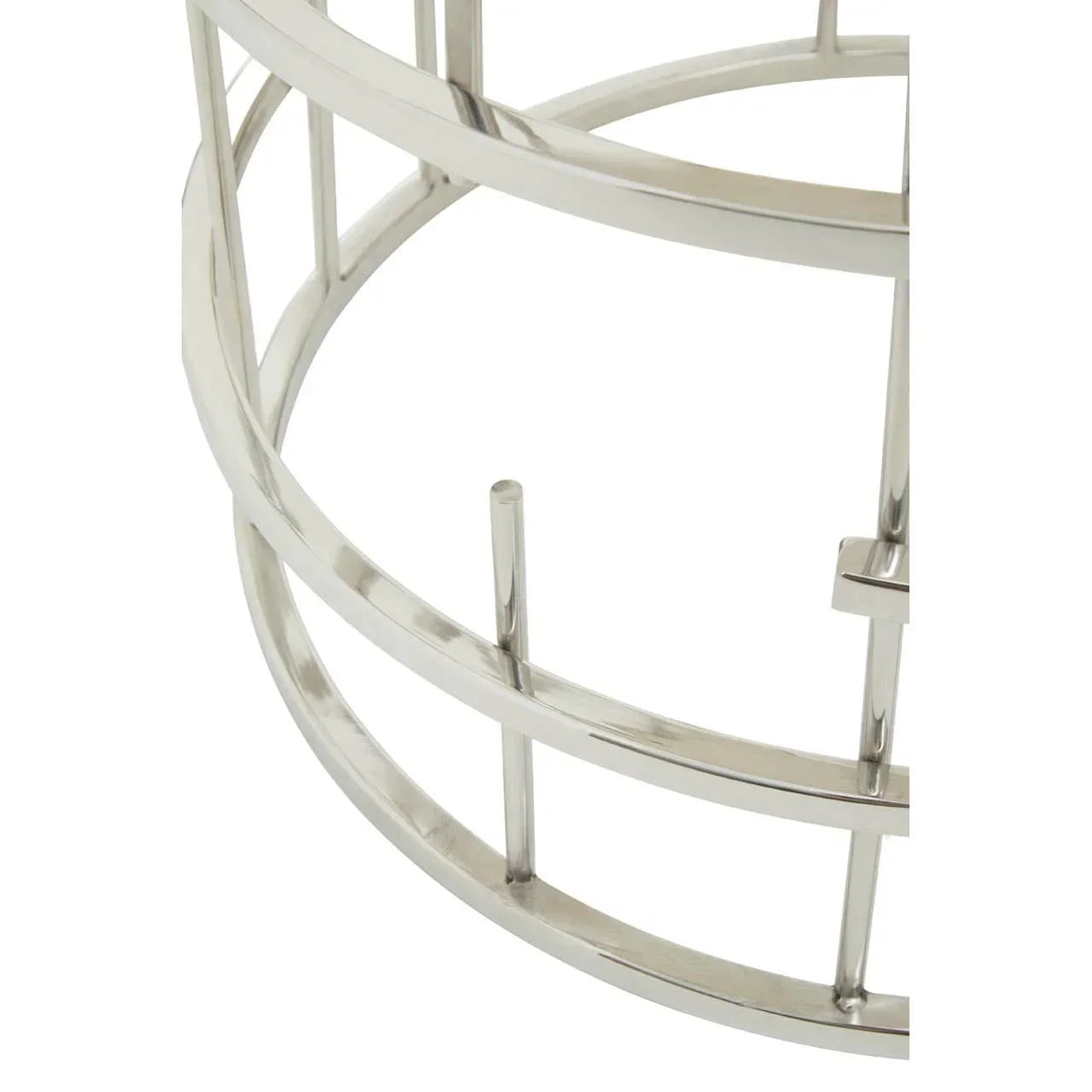Closeup of chrome metal coffee table base with modern geometric design