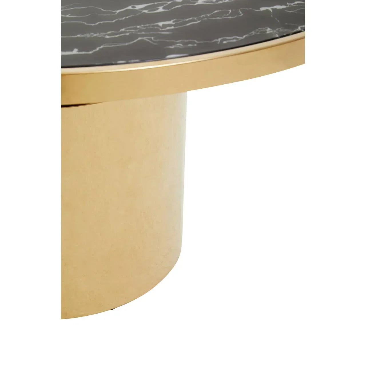Black marble coffee table with gold cylindrical base, close-up of edge and surface