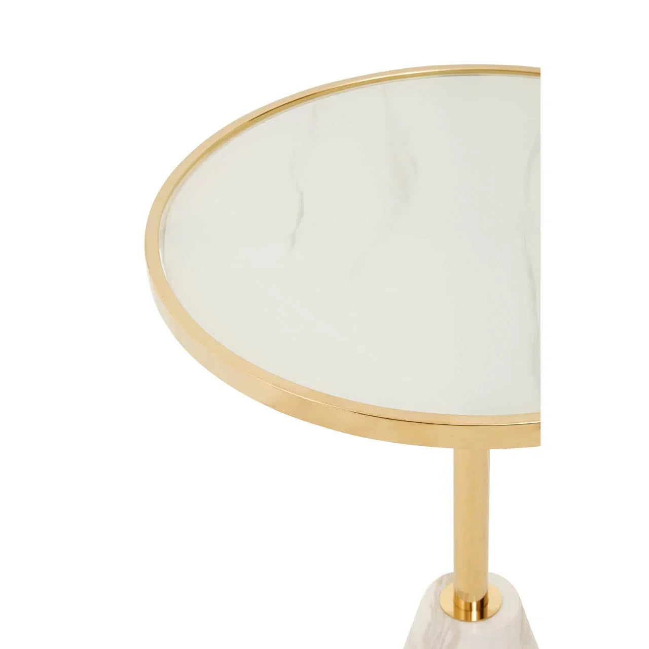 Round side table with white marble top and gold metal frame, partial overhead view