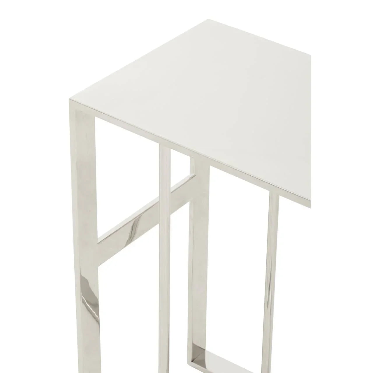 White gloss side table with chrome metal legs, close angle view of top and frame