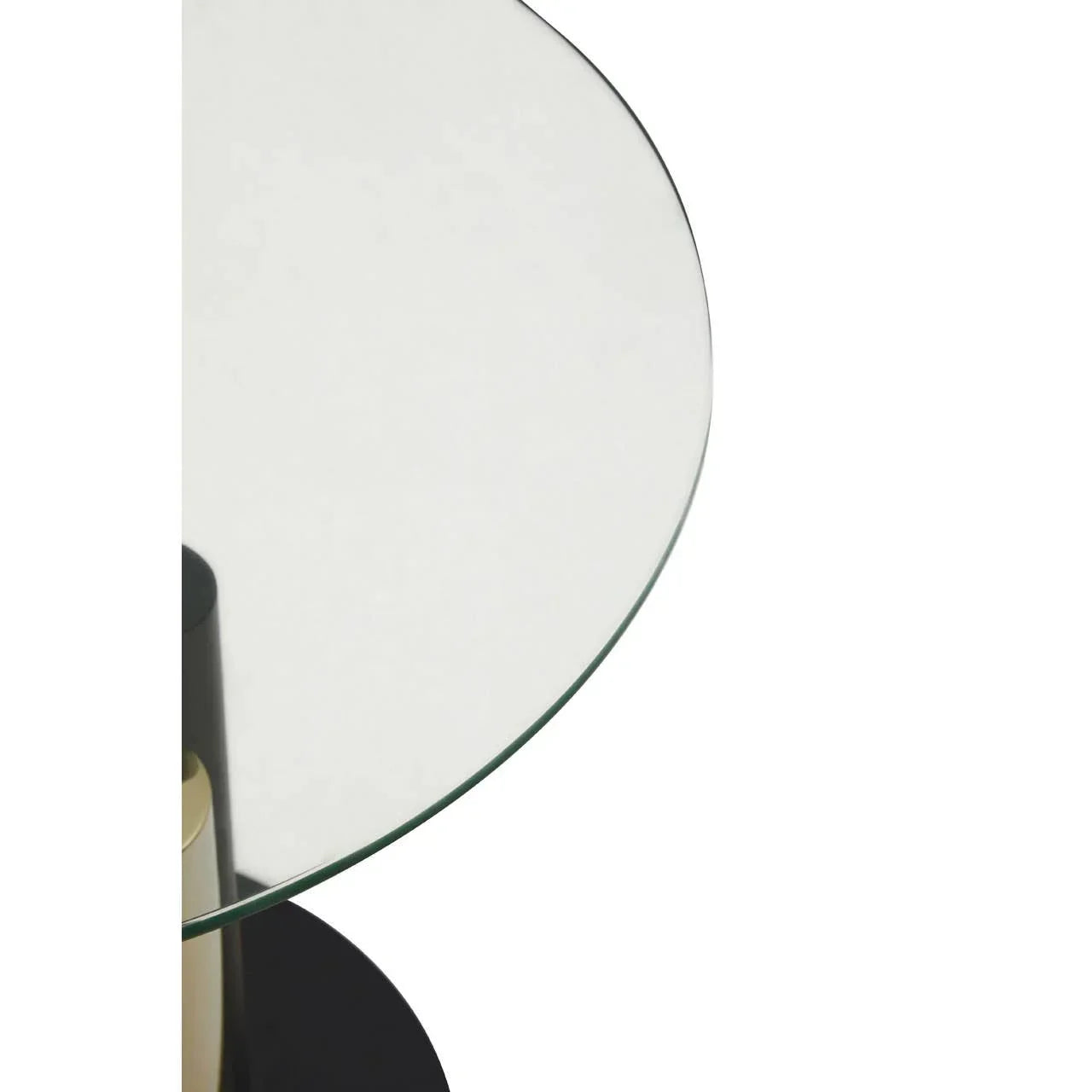 Round glass dining table top with metal base, close-up view