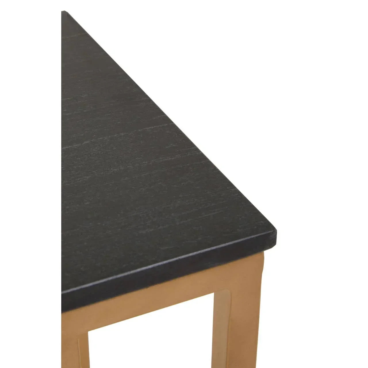 Black wood dining table corner with light wood legs, close-up of tabletop and frame