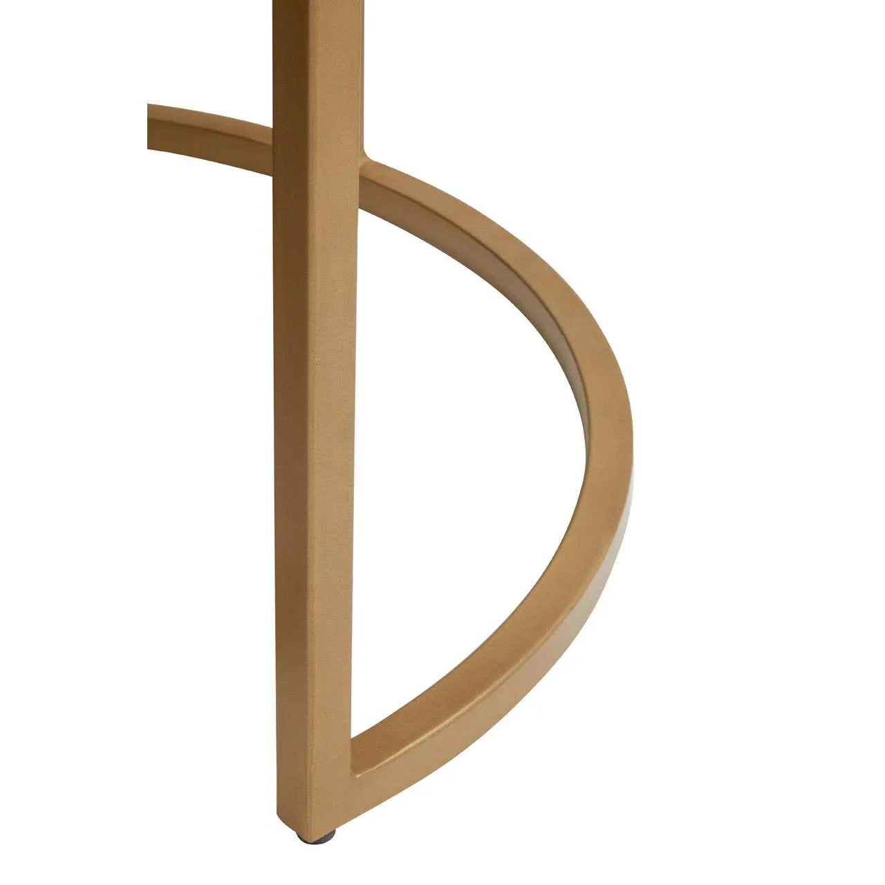 Gold metal furniture leg with curved support bar detail