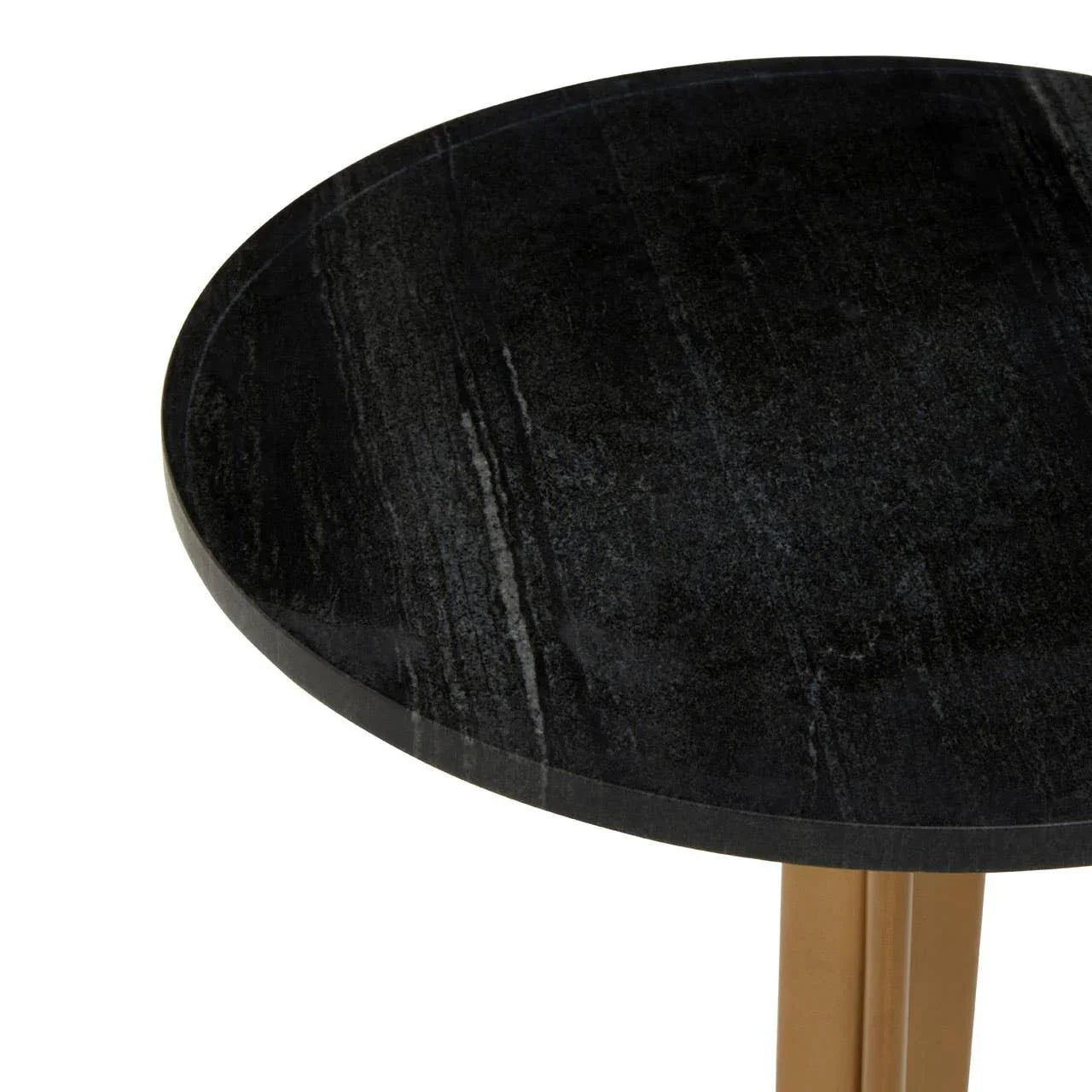 Black marble side table top with gold metal legs, close-up of surface texture