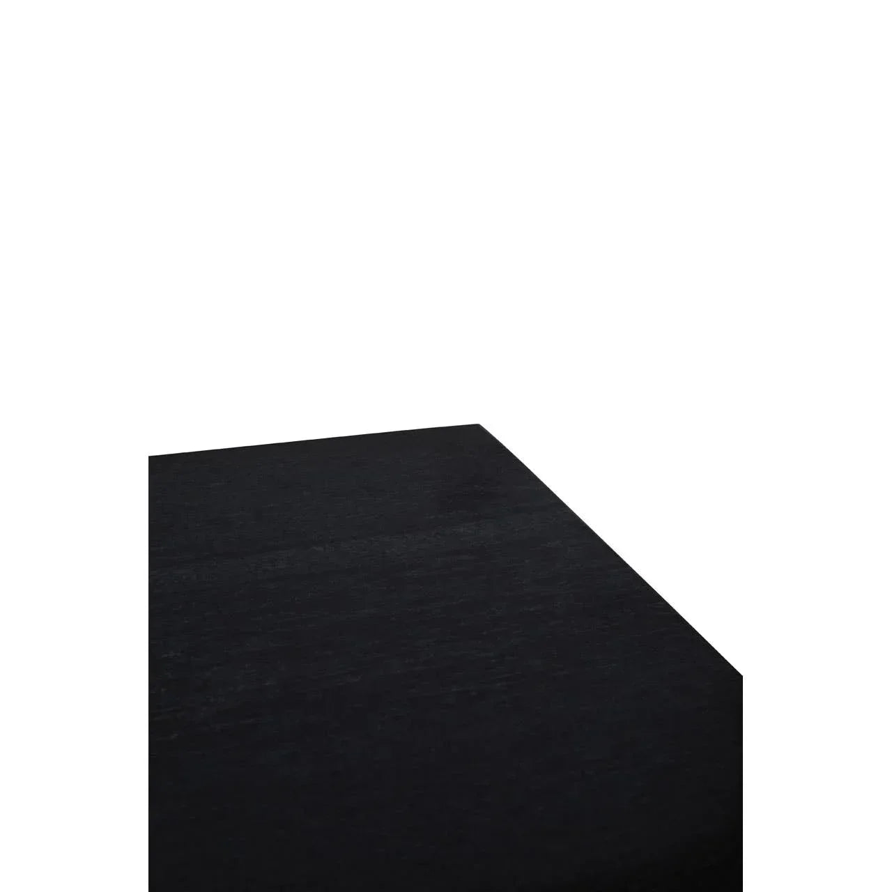 Corner detail of black wooden dining table surface