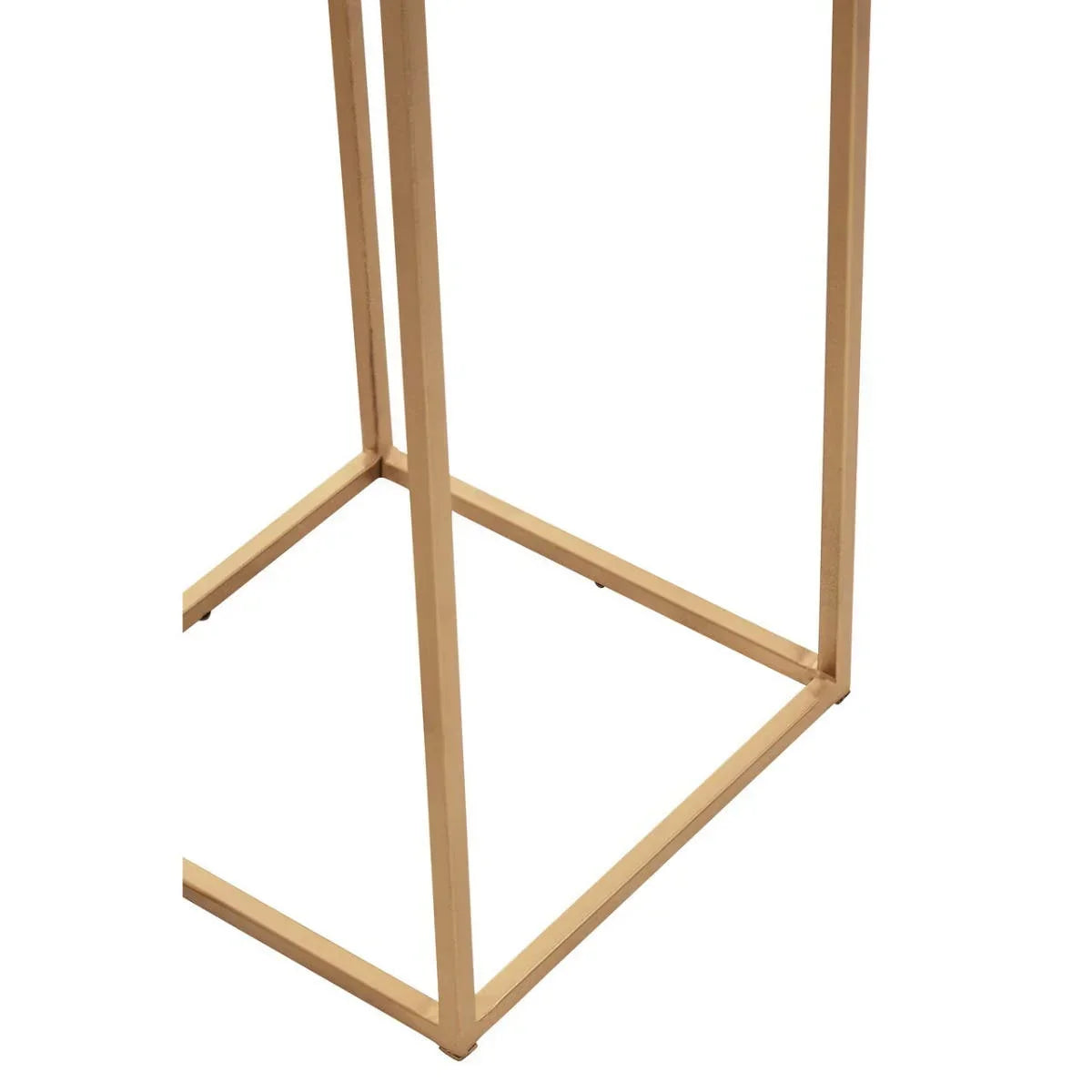 Gold metal table base with square frame and clean lines, close-up of the legs