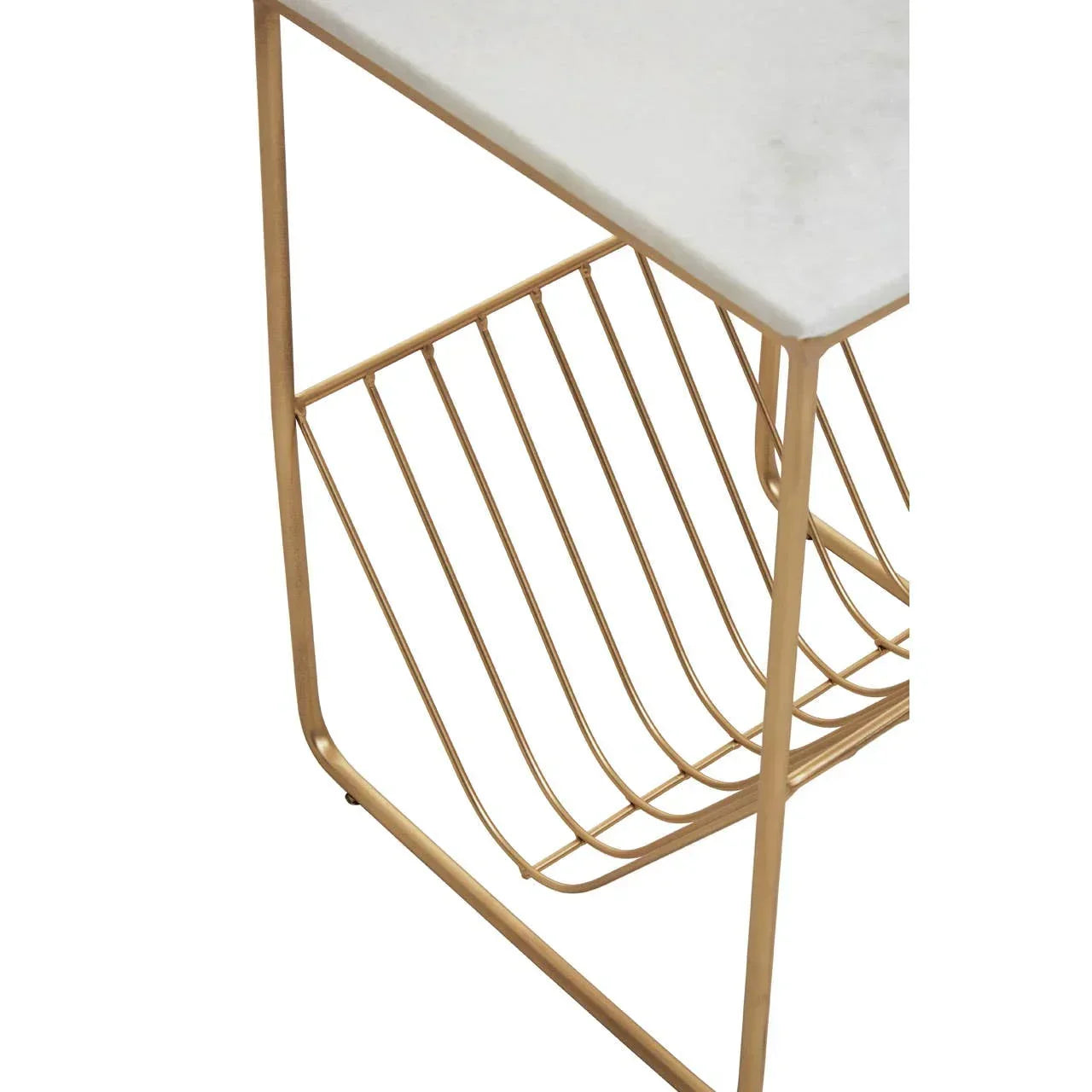 Close-up of marble top side table with gold metal magazine rack base