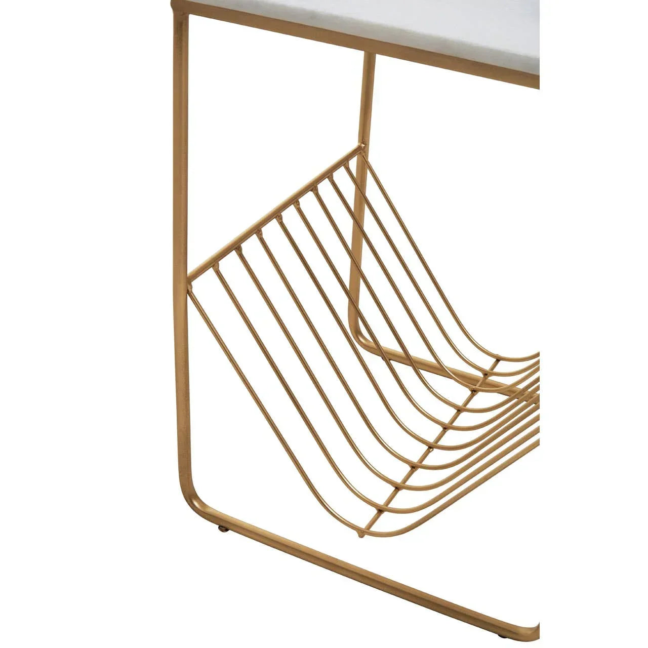 Gold metal magazine rack detail on side table with white top