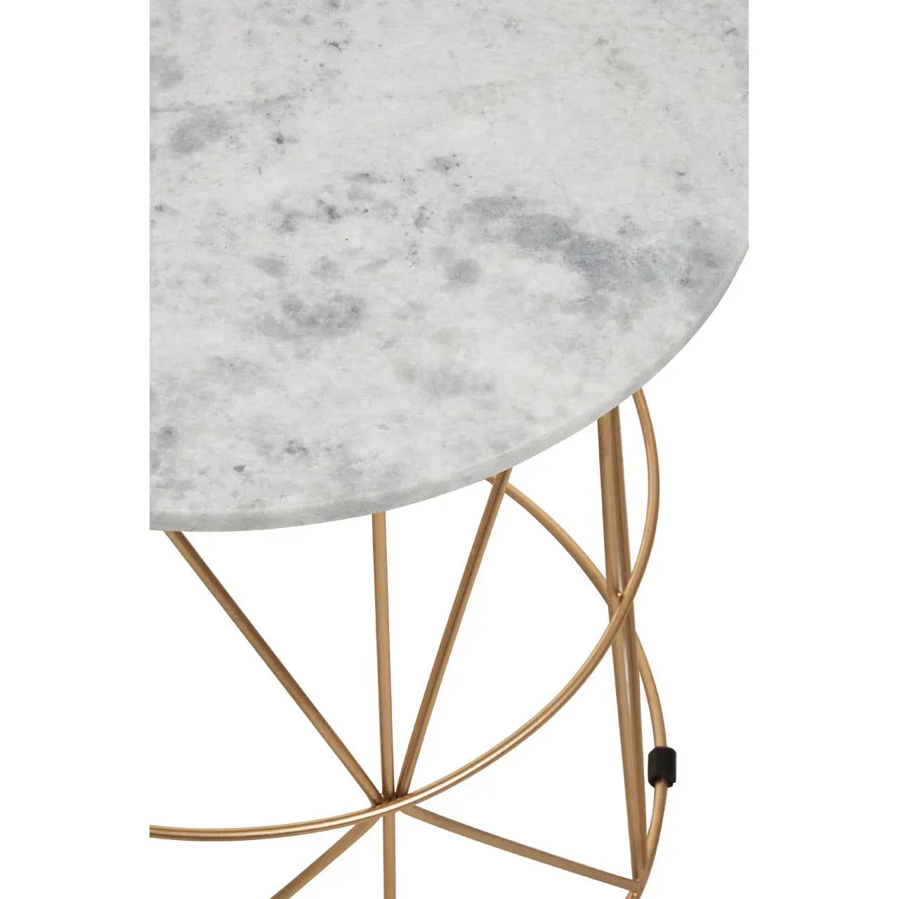 Round marble side table with gold metal geometric base, close-up of surface and frame