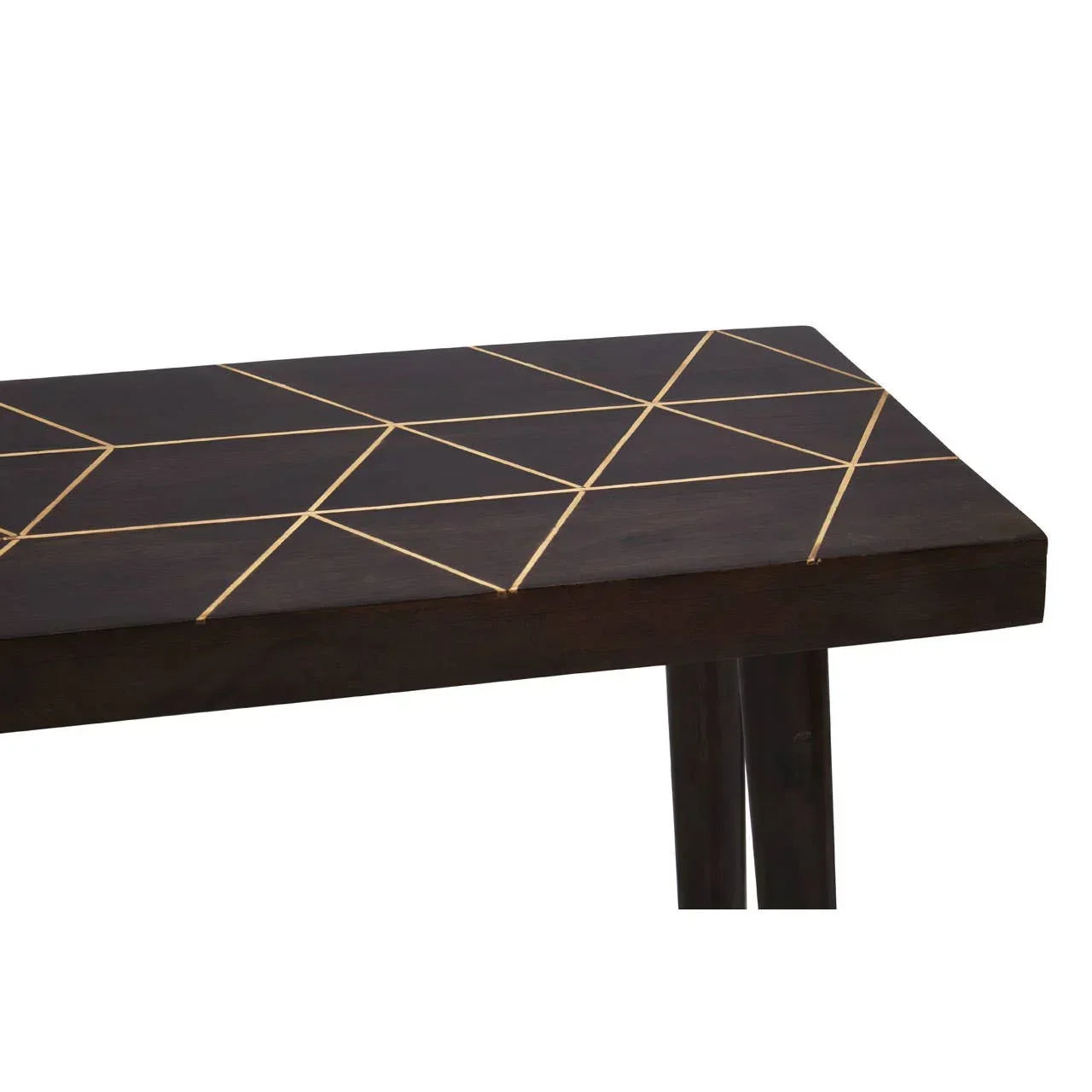 Dark wood dining table with gold geometric inlay on tabletop, corner view