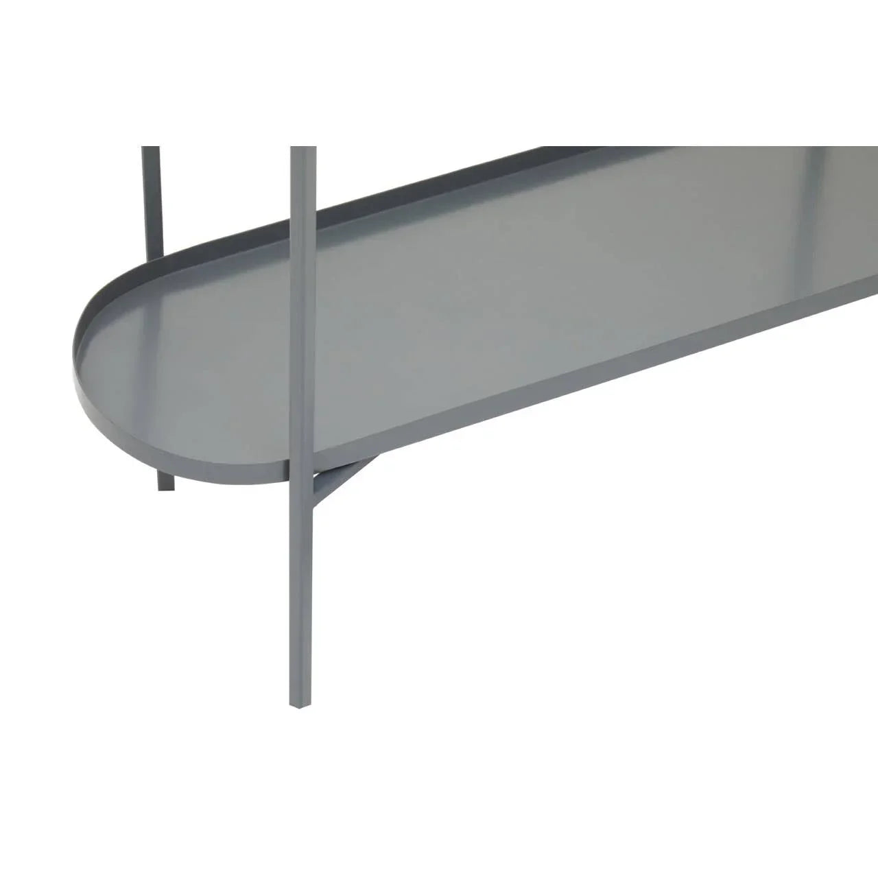 Close-up of grey metal console table lower shelf and slim legs
